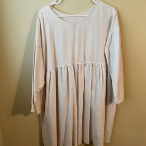Urban renewal baby doll dress with three quarter length sleeves.